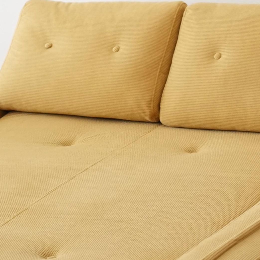 Flippo Sofa Bed in Yellow color – bold sculptural design, soft corduroy fabric, easily converts to bed, modern living room furniture
