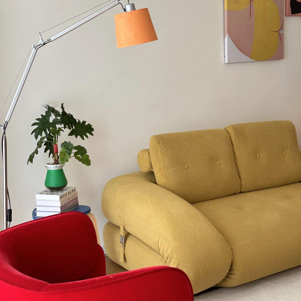Flippo Sofa Bed in Yellow color – bold sculptural design, soft corduroy fabric, easily converts to bed, modern living room furniture
