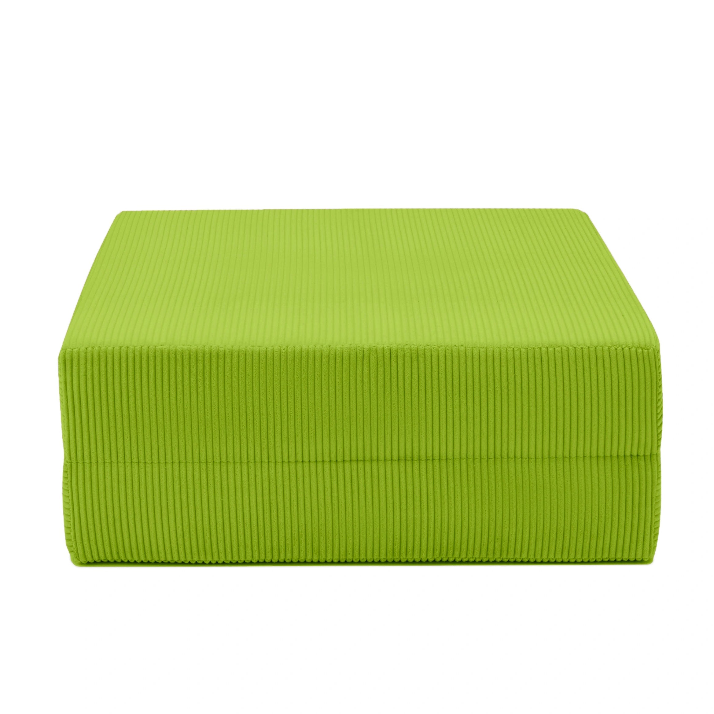 Green ribbed ottoman on a white background
